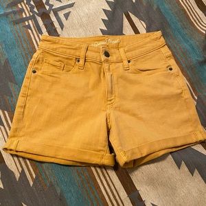 Mustard shorts.